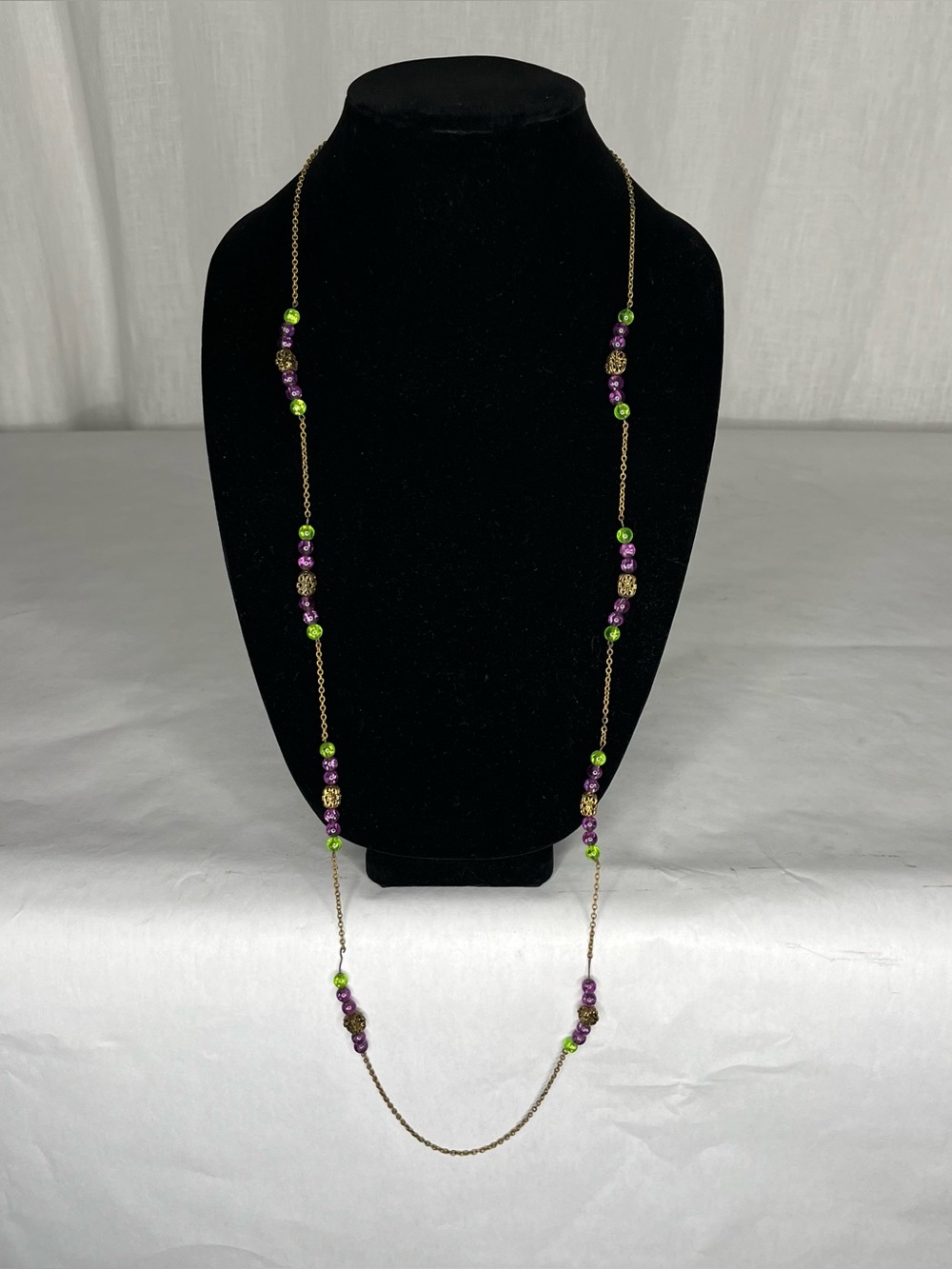 Green and purple beaded necklace